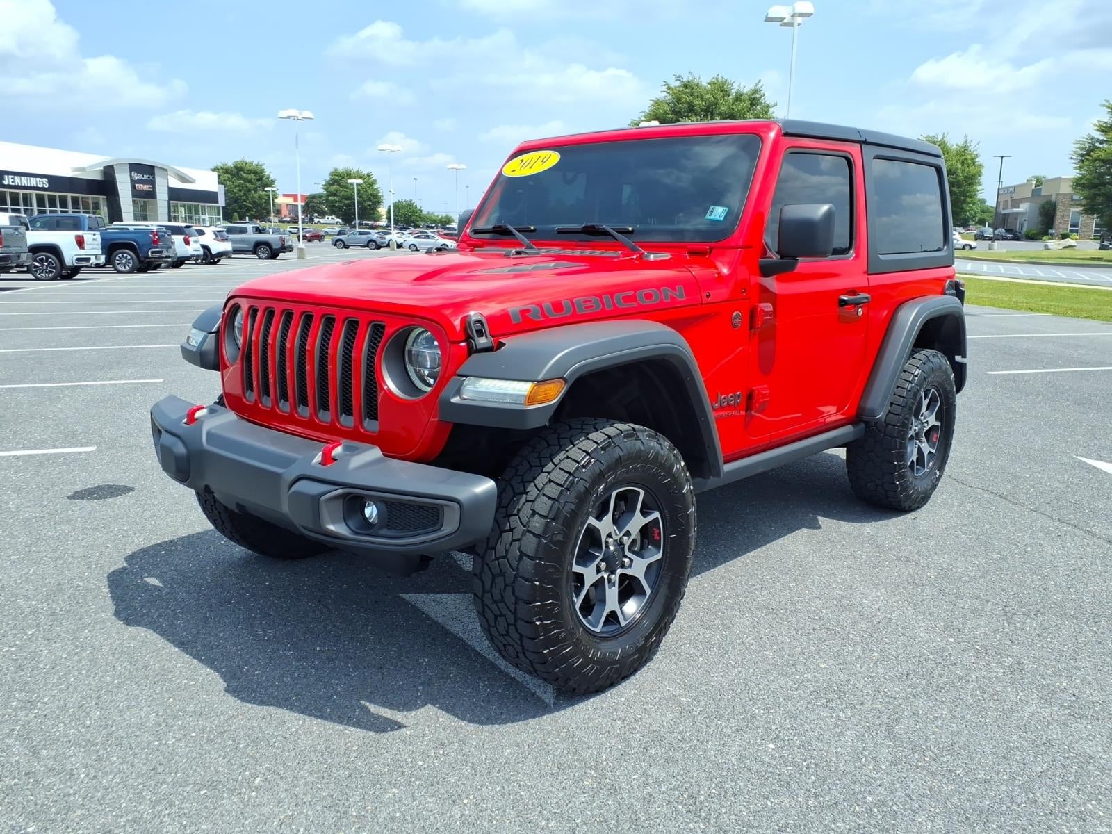 2019 Jeep Wrangler Rubicon 4x4 in Red — front three-quarter view