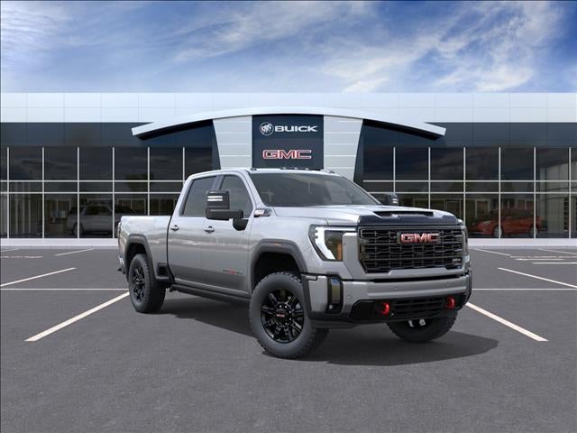 2026 GMC Sierra 2500 HD AT4 in Sterling Metallic — front three-quarter view