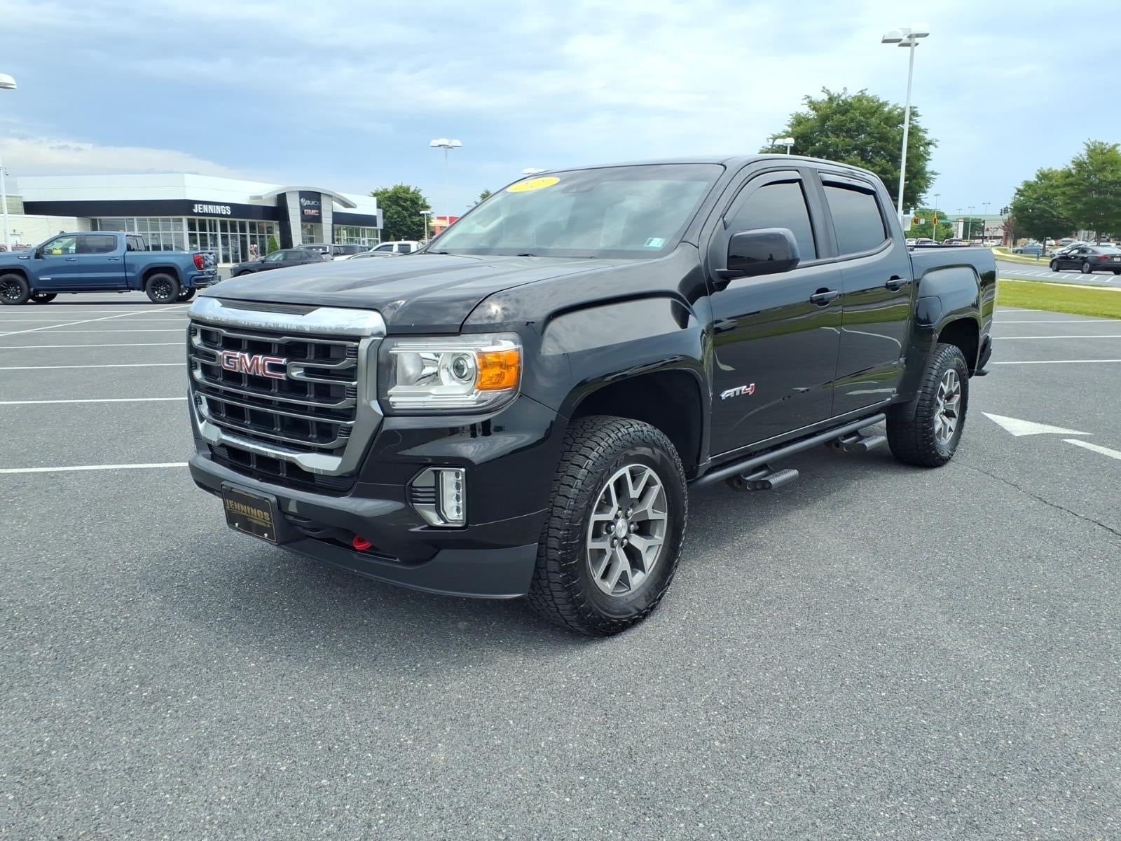 2021 GMC Canyon 4WD AT4 w/Leather in Onyx Black — front three-quarter view
