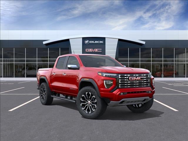 2026 GMC Canyon Denali in Volcanic Red Tintcoat — front three-quarter view